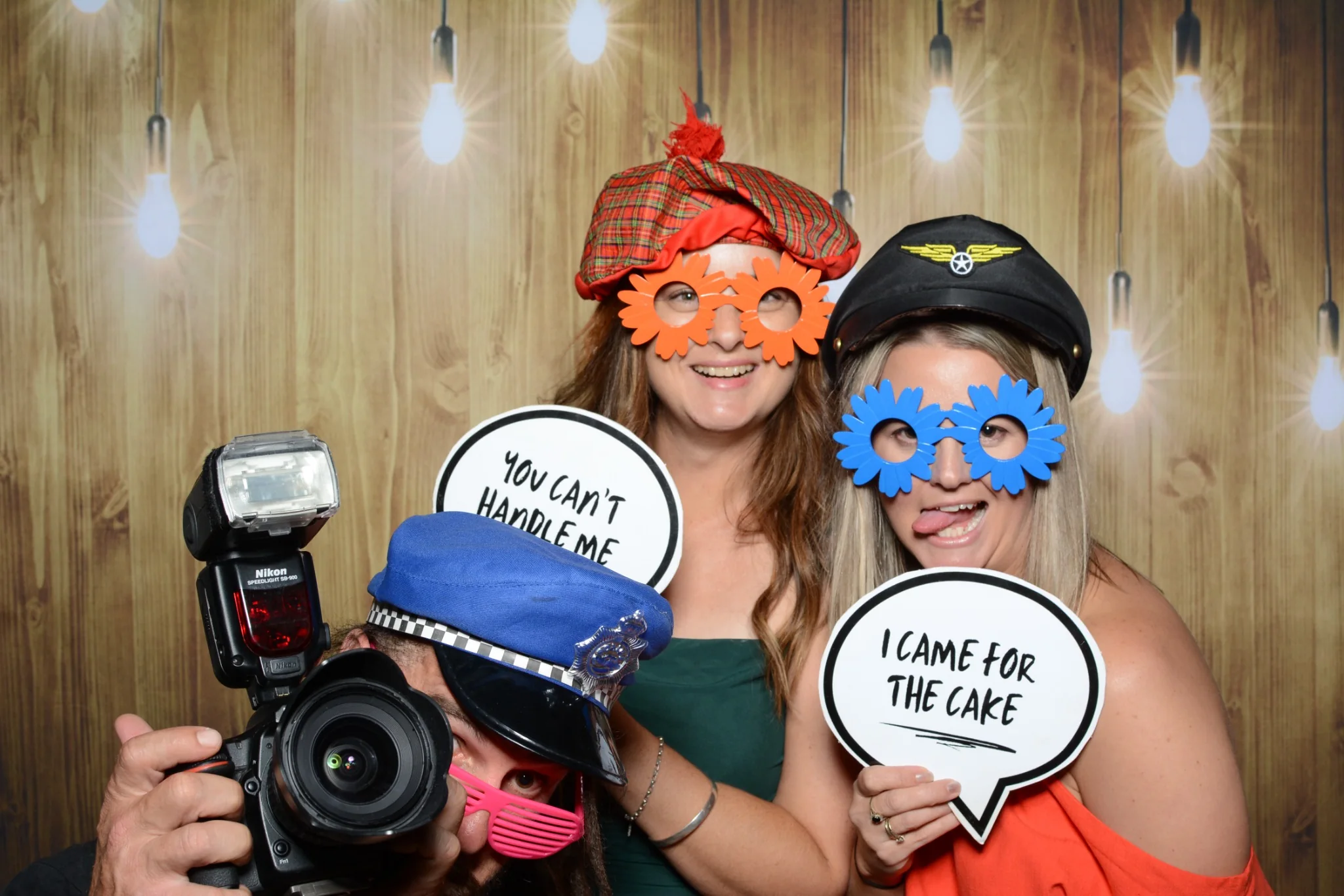 Guests getting creative with photo booth props